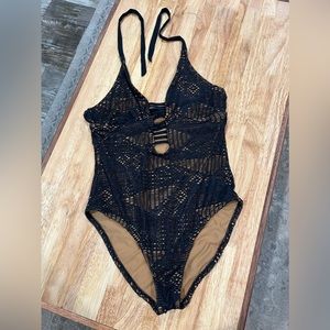 One piece bathing suit lace detail